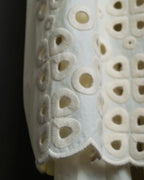 "FENDI" hole pattern and tack designed skirt