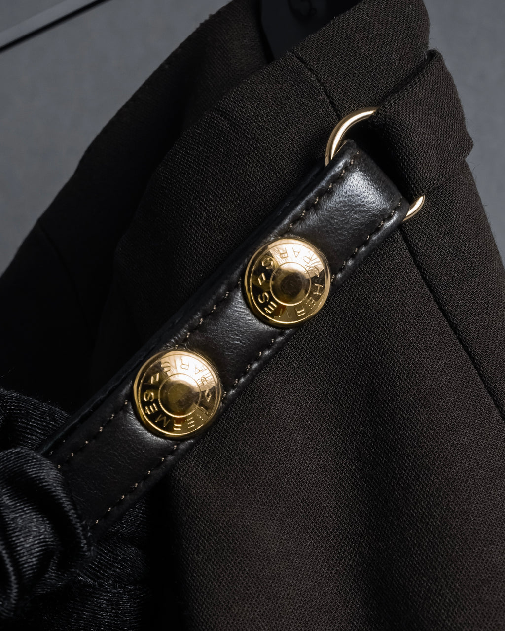 "HERMES" 90's Gold parts design derived from horse tack flared skirt