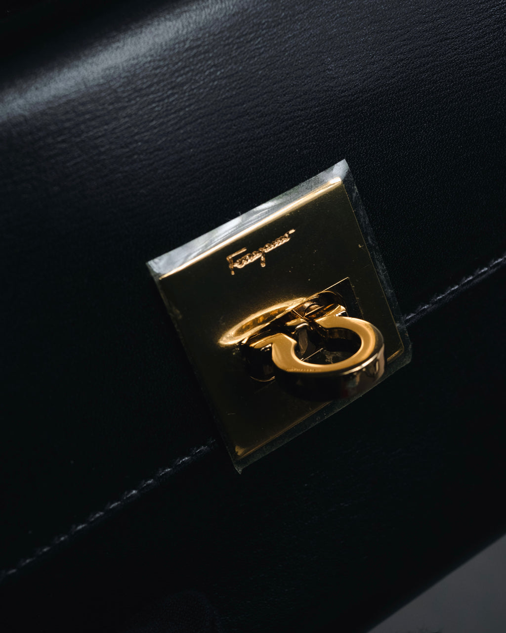 "Salvatore Ferragamo" 90’s Gancini clasp kiss lock tri fold wallet