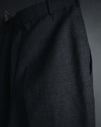 "CHANEL" high-waisted pleated trousers with signature gold button