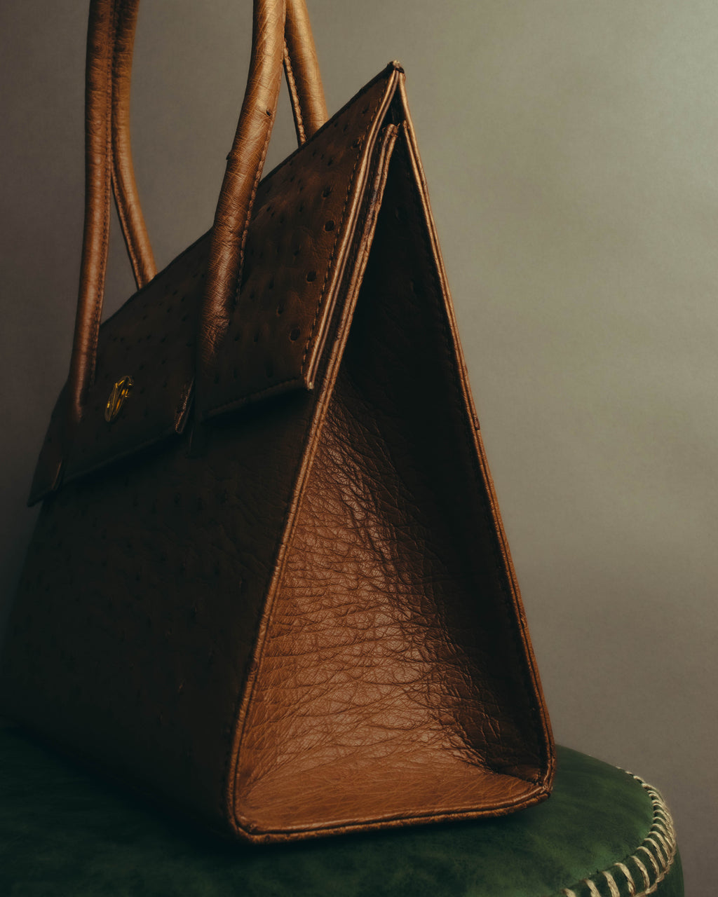 “GIOVANNI VALENTINO” Structured ostrich top handle bag