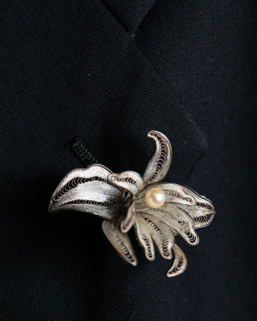 "Vintage petal motif broach"
