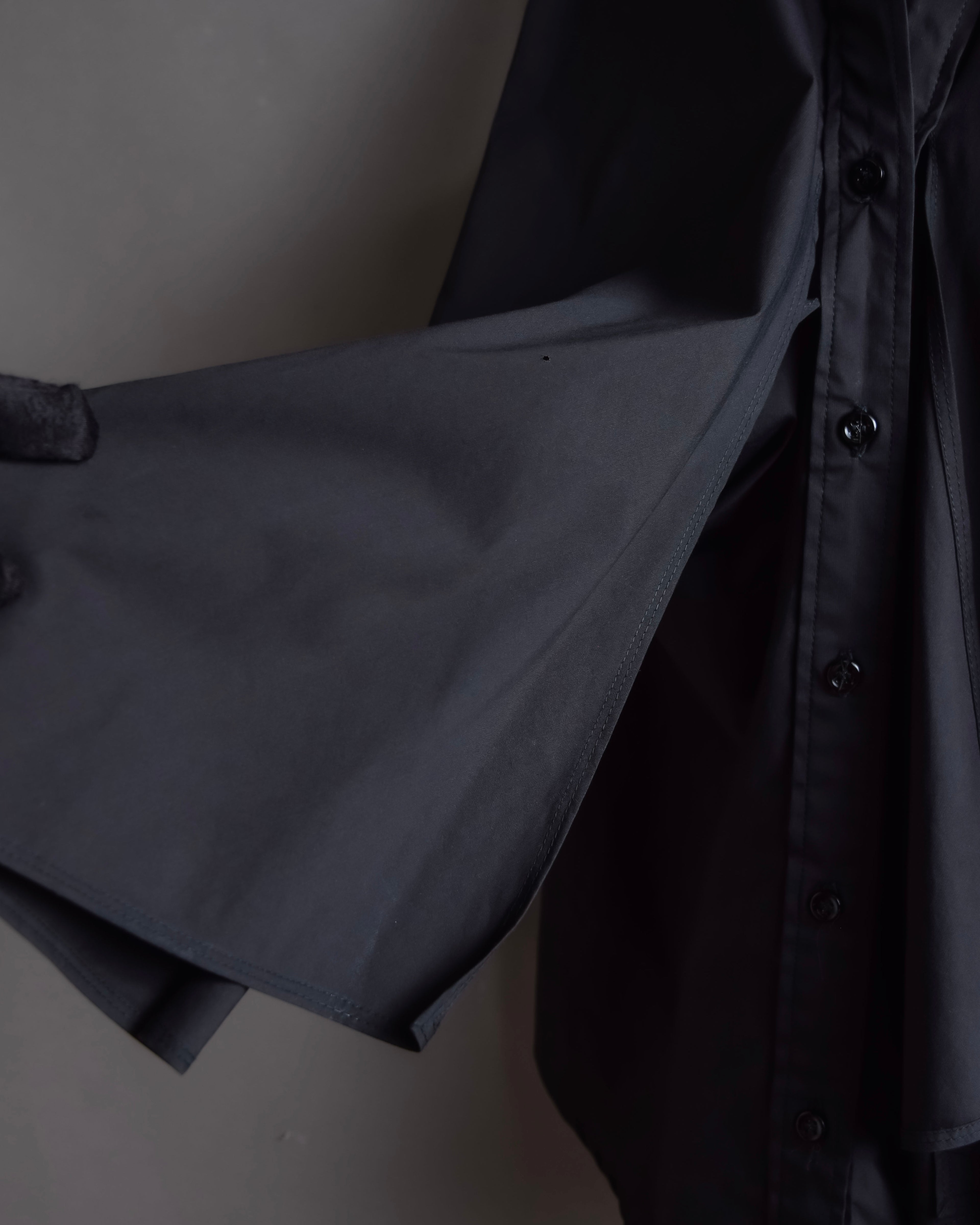 "Yves Saint Laurent Rive Gauche"
Twisted front sleeveless shirt