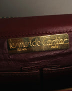 “Cartier” 80’s-90’s Must de Cartier burgundy leather shoulder bag