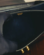 -SPECIAL- “HERMÈS” 50’s-60’s sculptural oval clasp midnight navy leather handbag
