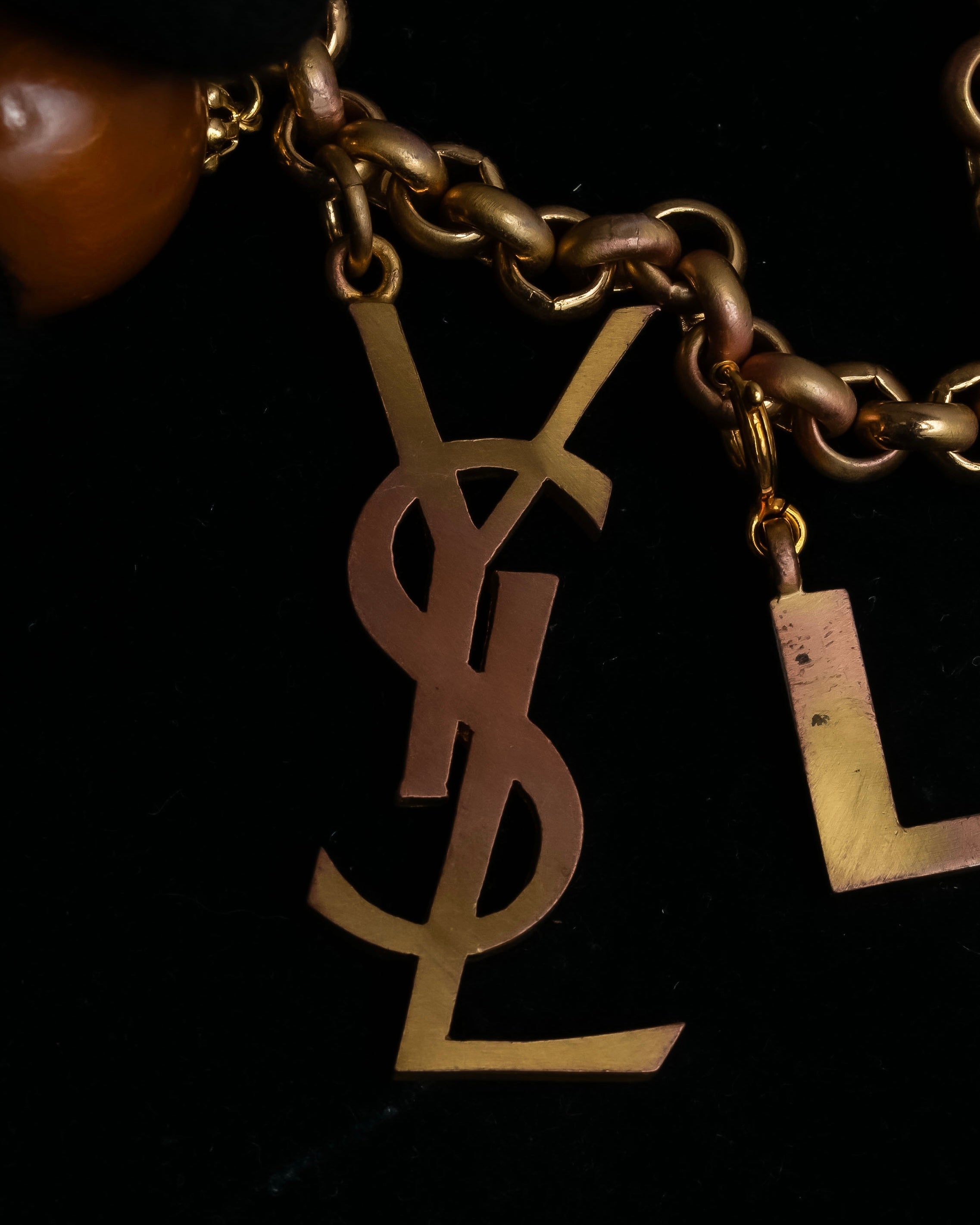 "YVES SAINT LAURENT" LOVE typography &amp; Cassandra motif design bracelet