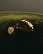 “Nina Ricci” 80's-90's Gold-tone floral clip-on earrings
