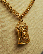 “NINA RICCI” Late 80’s-90’s gold tone openwork pendant necklace