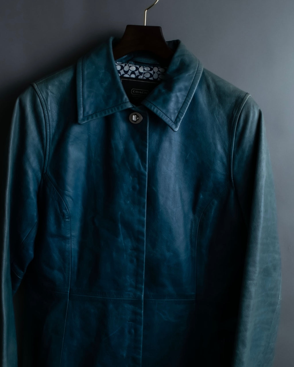 "COACH" light blue faded leather coat