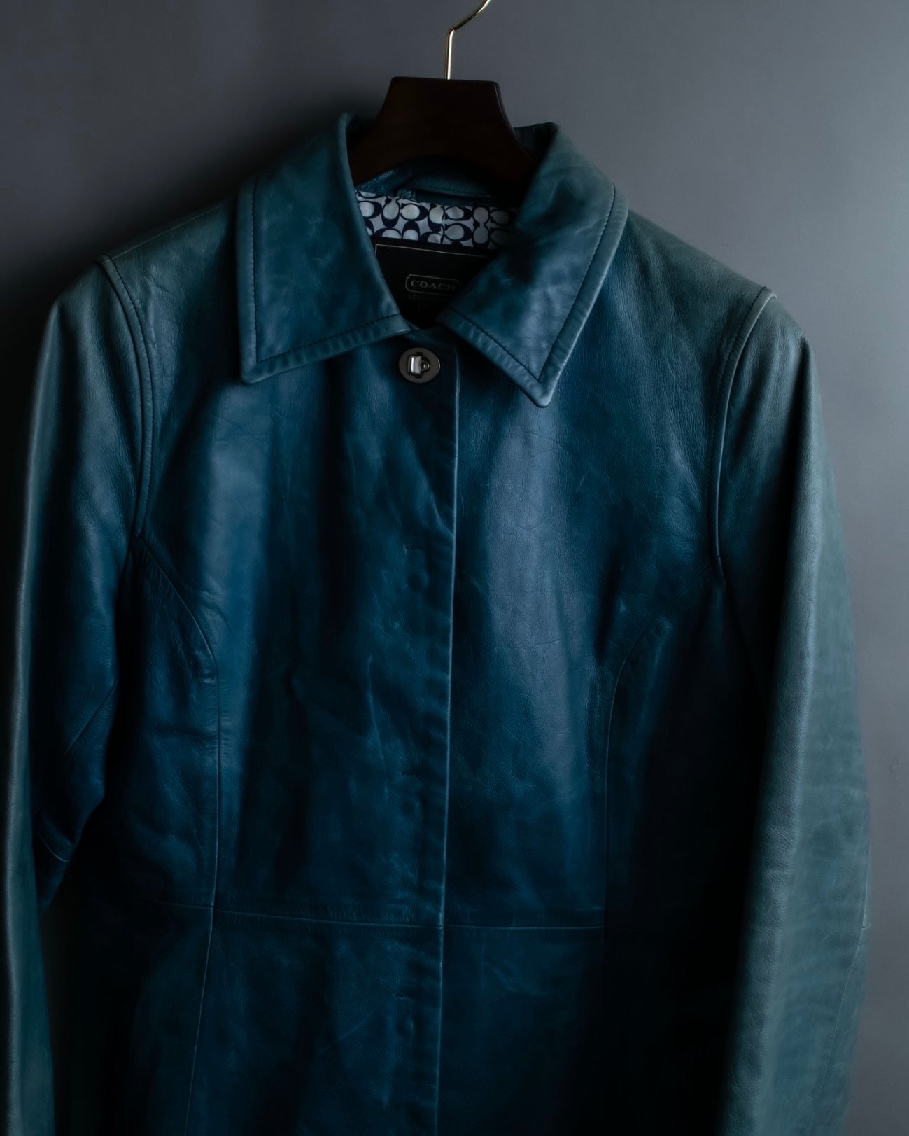 "COACH" light blue faded leather coat