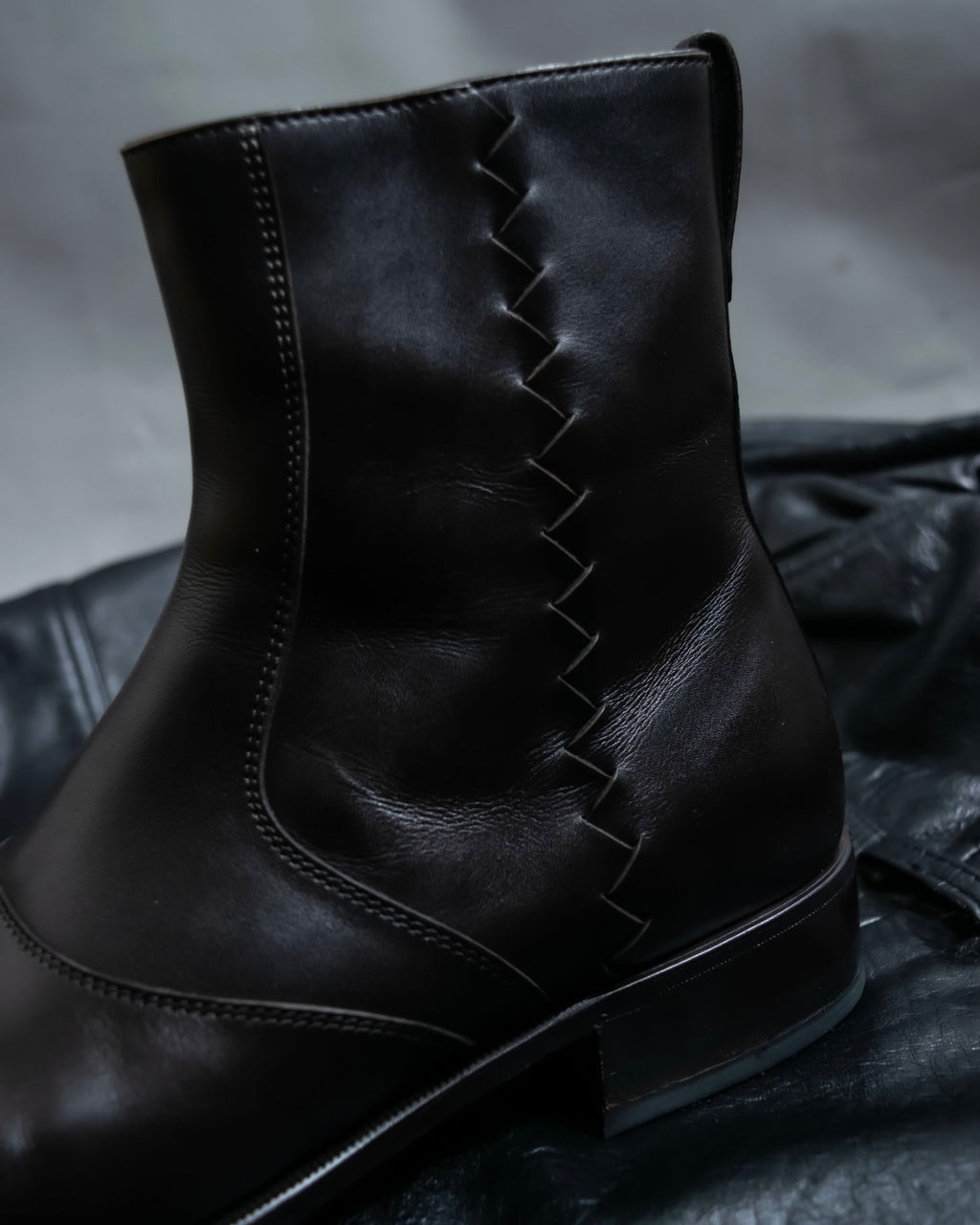 “BOTTEGA VENETA” round toe intrecciato leather boots