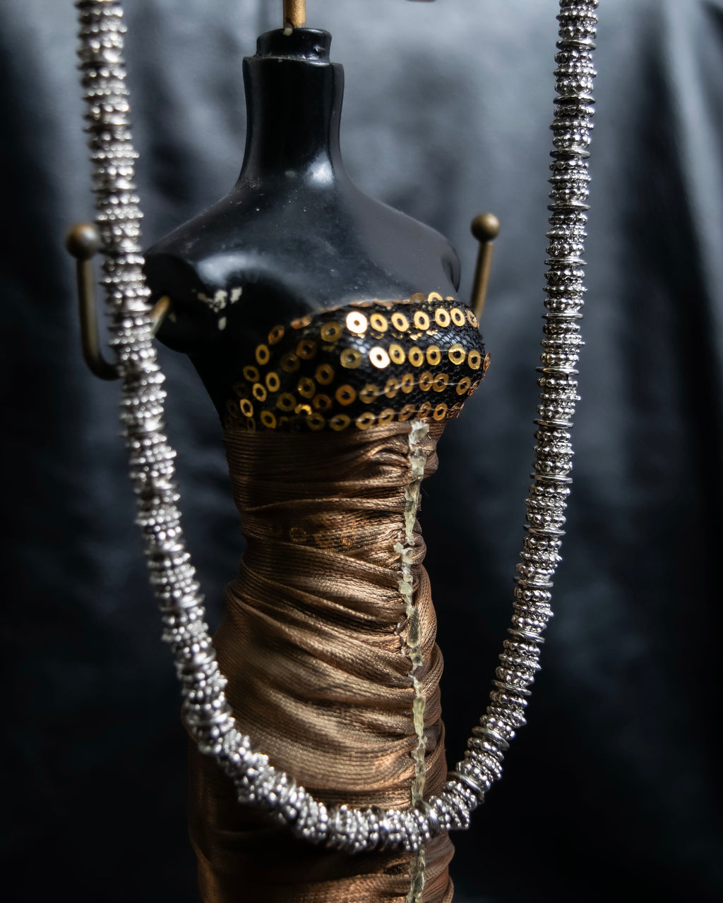 "Yves Saint Laurent"
Different sized beads silver necklace