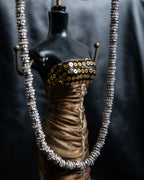 "Yves Saint Laurent"
Different sized beads silver necklace