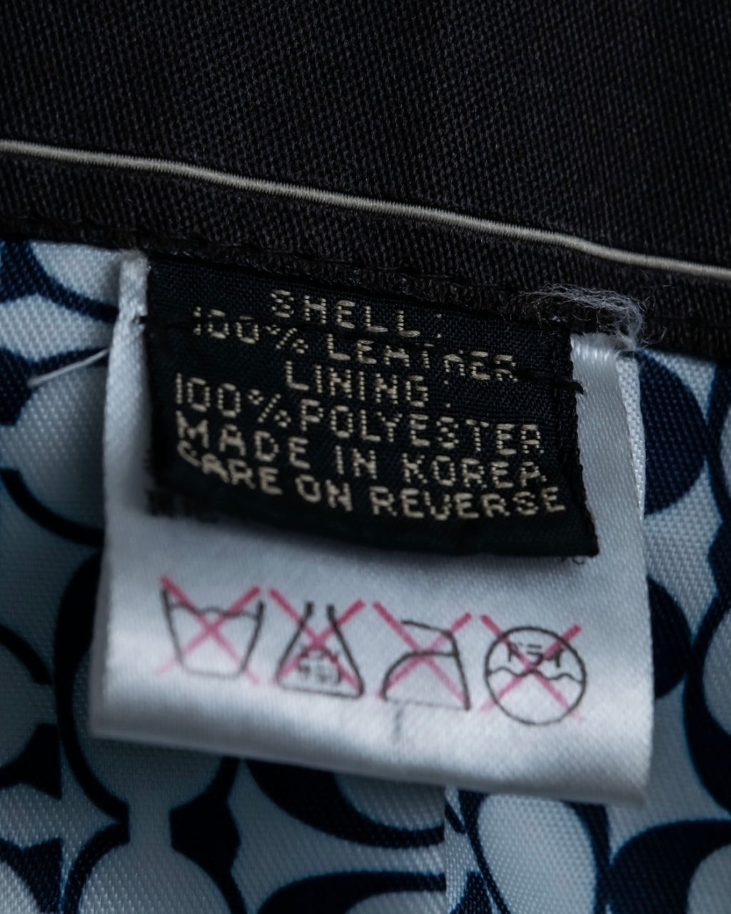 "COACH" light blue faded leather coat