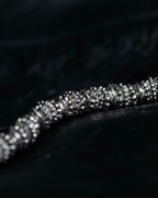 "Yves Saint Laurent"
Different sized beads silver necklace