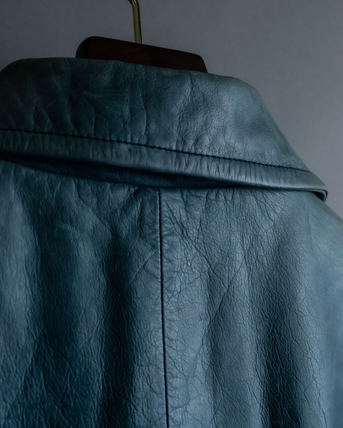 "COACH" light blue faded leather coat