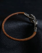"HERMES" Cross iron bangle
