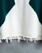 Distressed long sleeve knit