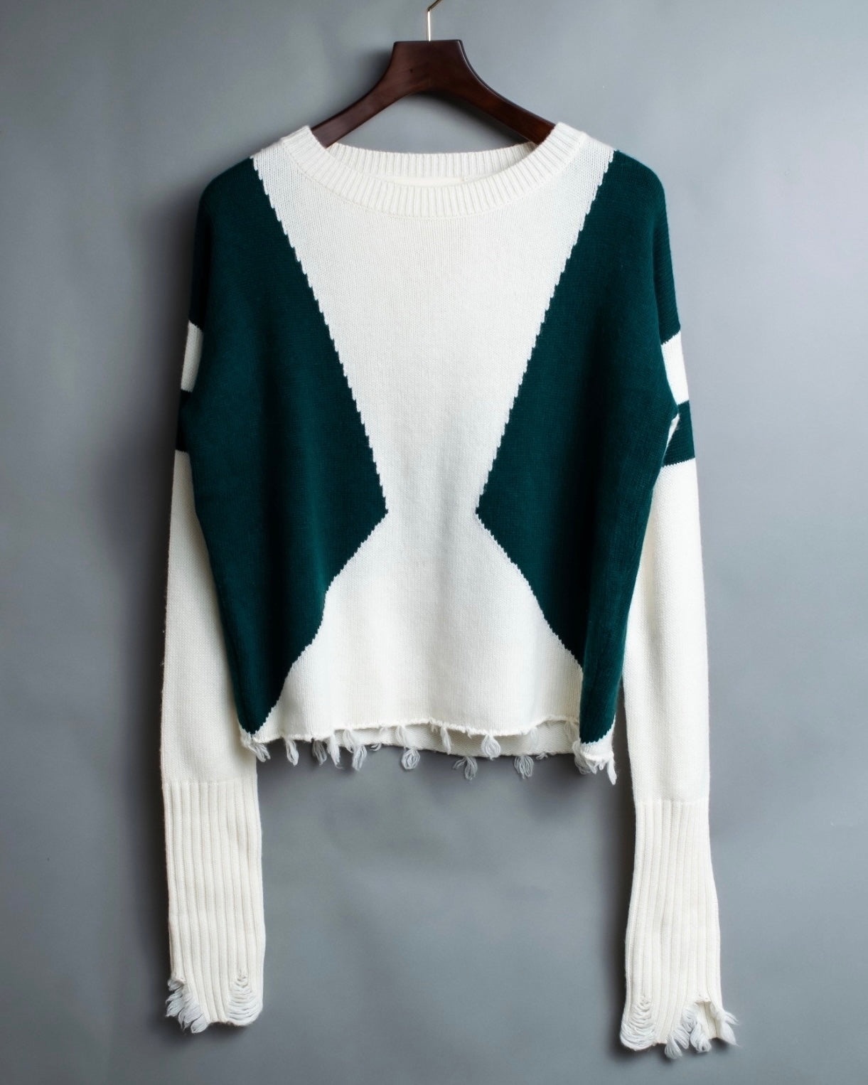 Distressed long sleeve knit