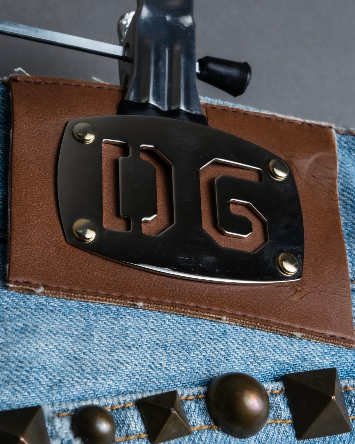 "DOLCE &amp; GABBANA" various studded distressed denim