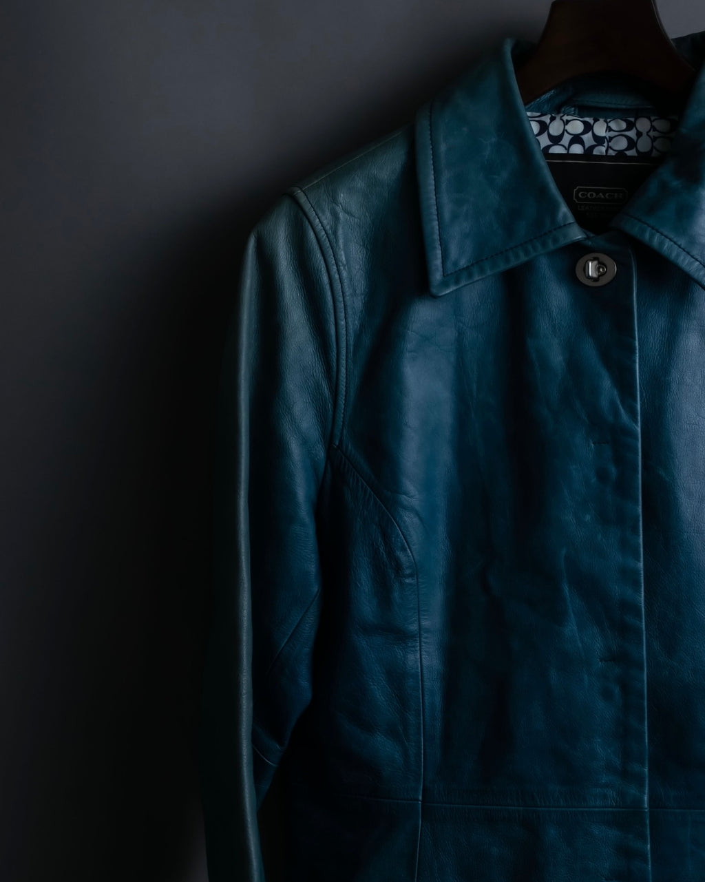 "COACH" light blue faded leather coat