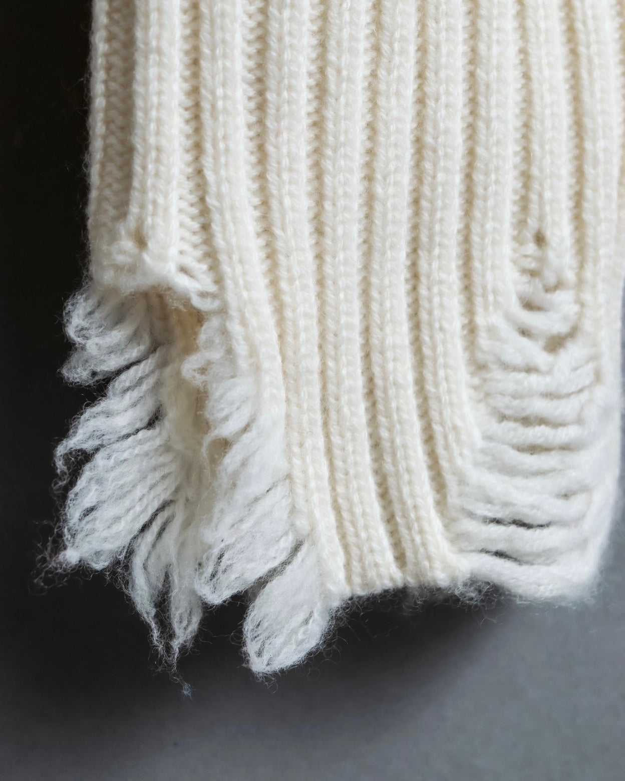 Distressed long sleeve knit