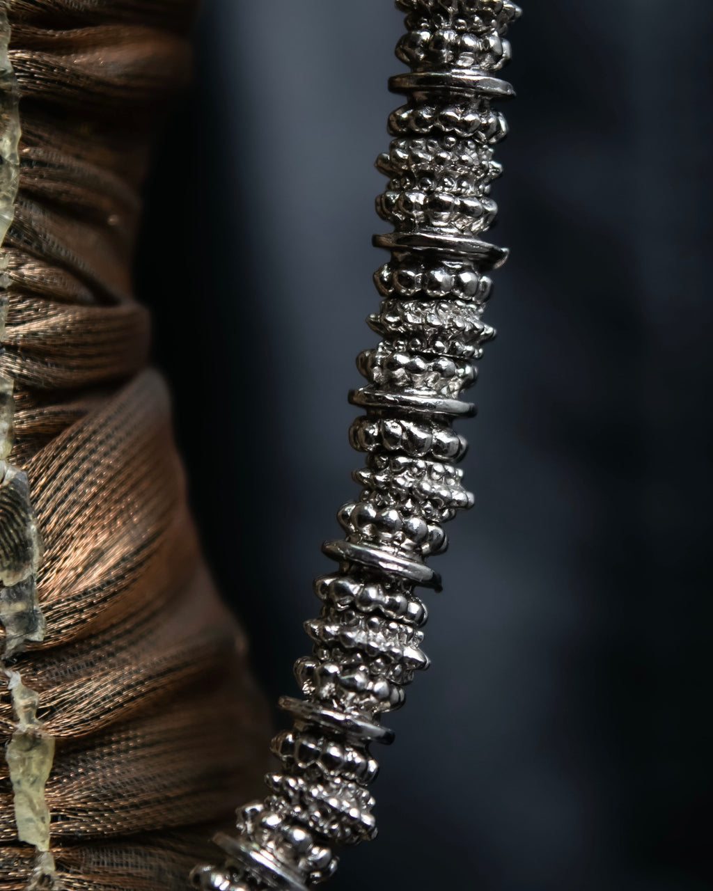 "Yves Saint Laurent"
Different sized beads silver necklace