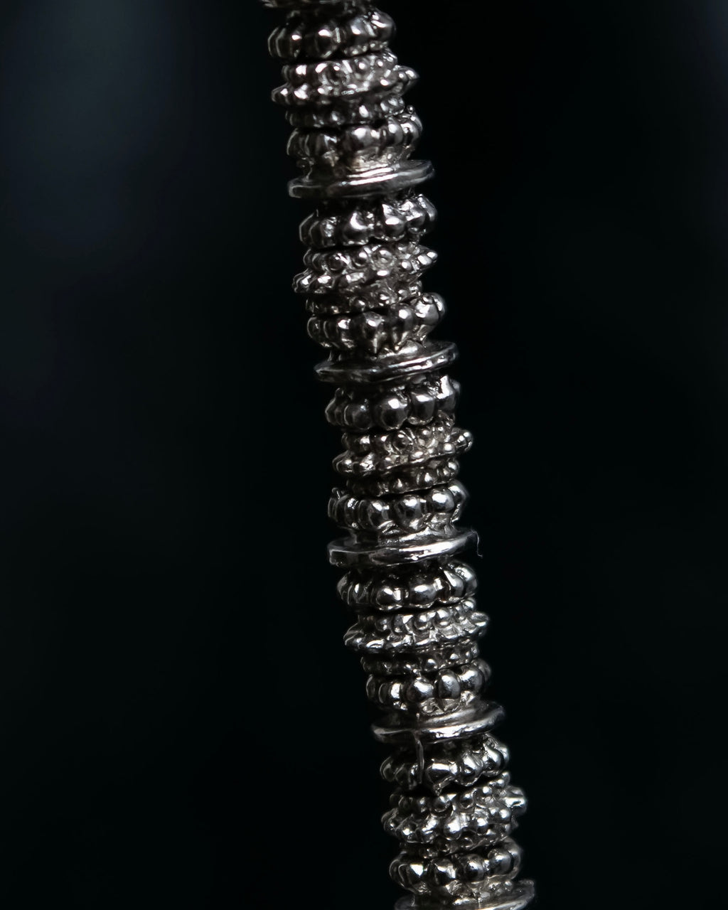 "Yves Saint Laurent"
Different sized beads silver necklace