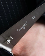 “CHANEL”  metal plate flame oval sunglasses