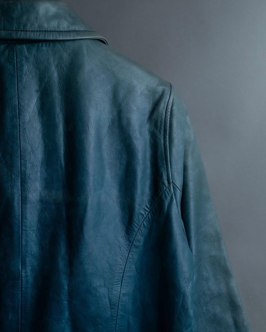 "COACH" light blue faded leather coat