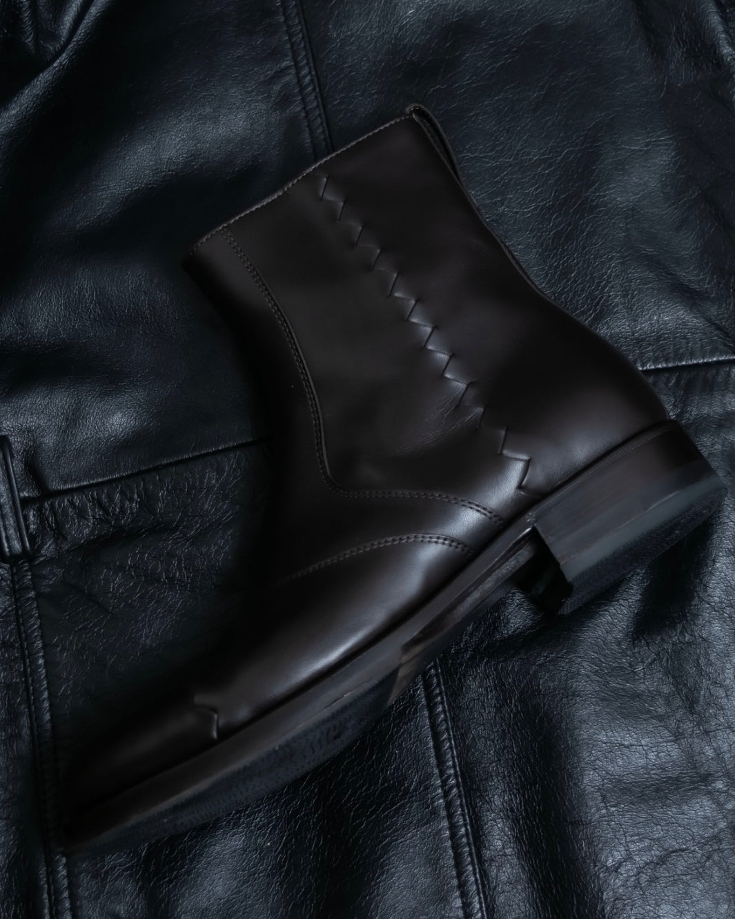 “BOTTEGA VENETA” round toe intrecciato leather boots