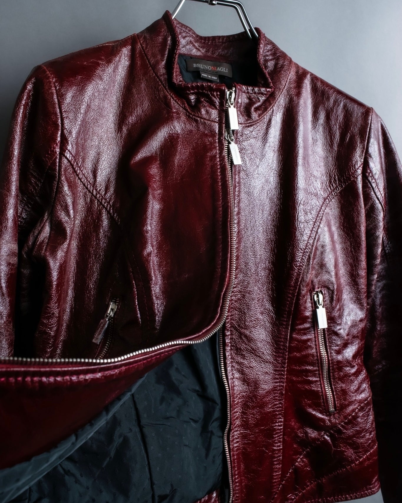 "BRUNOMAGLI" Scratched leather double zip red jacket