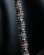 "Yves Saint Laurent"
Different sized beads silver necklace