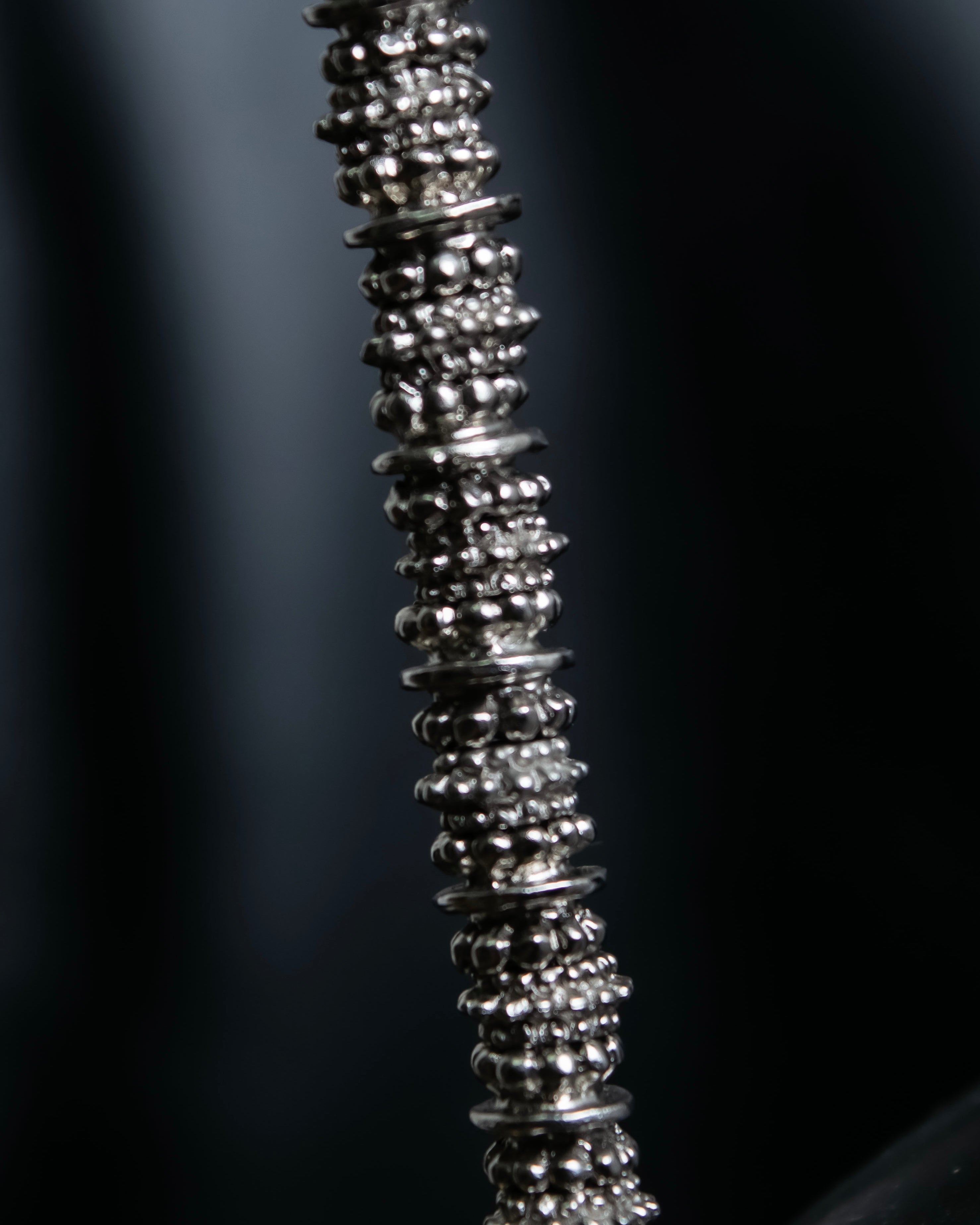 "Yves Saint Laurent"
Different sized beads silver necklace