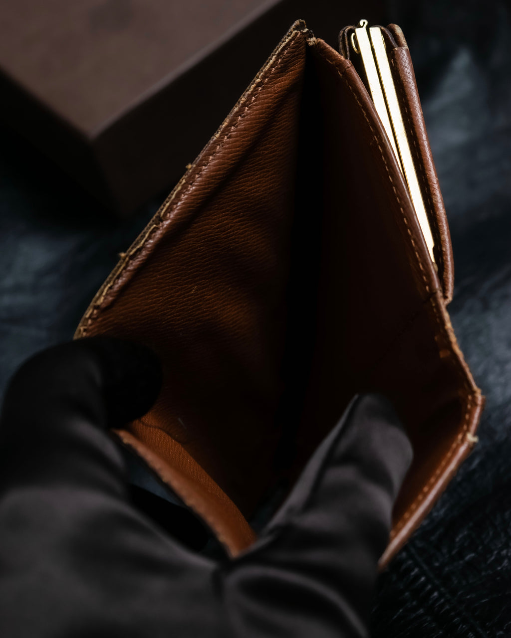 “Louis Vuitton” gold attachment designed monogram wallet