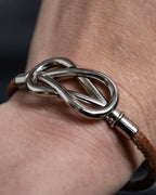 "HERMES" Cross iron bangle