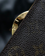 “Louis Vuitton” gold attachment designed monogram wallet