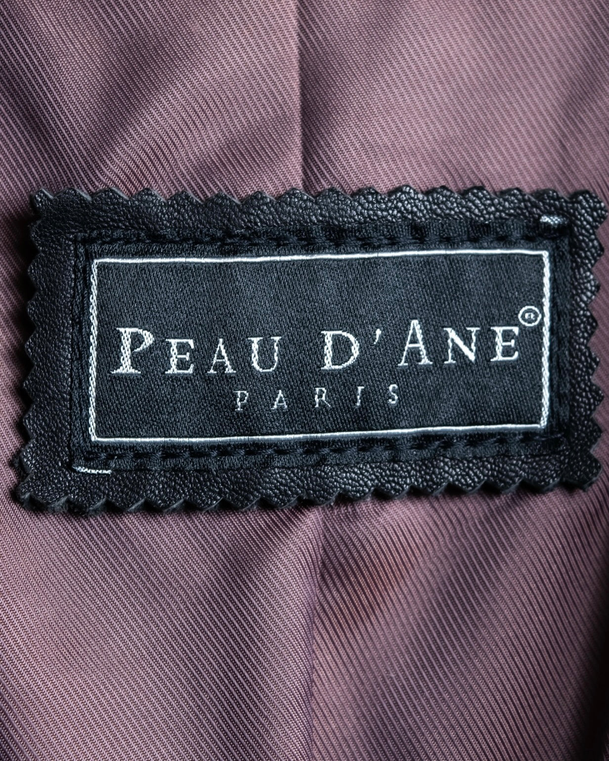 "PEAU D' ANÉ" wide lapel leather coat
