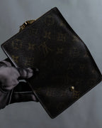 “Louis Vuitton” gold attachment designed monogram wallet