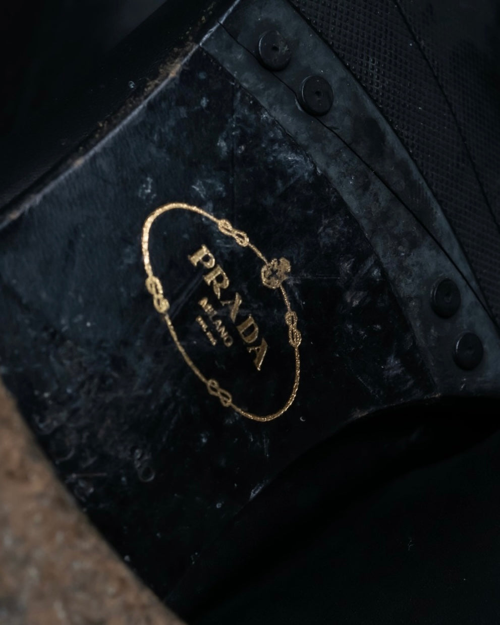 "PRADA" engineered leather boots