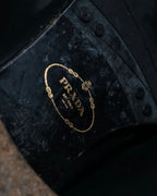 "PRADA" engineered leather boots
