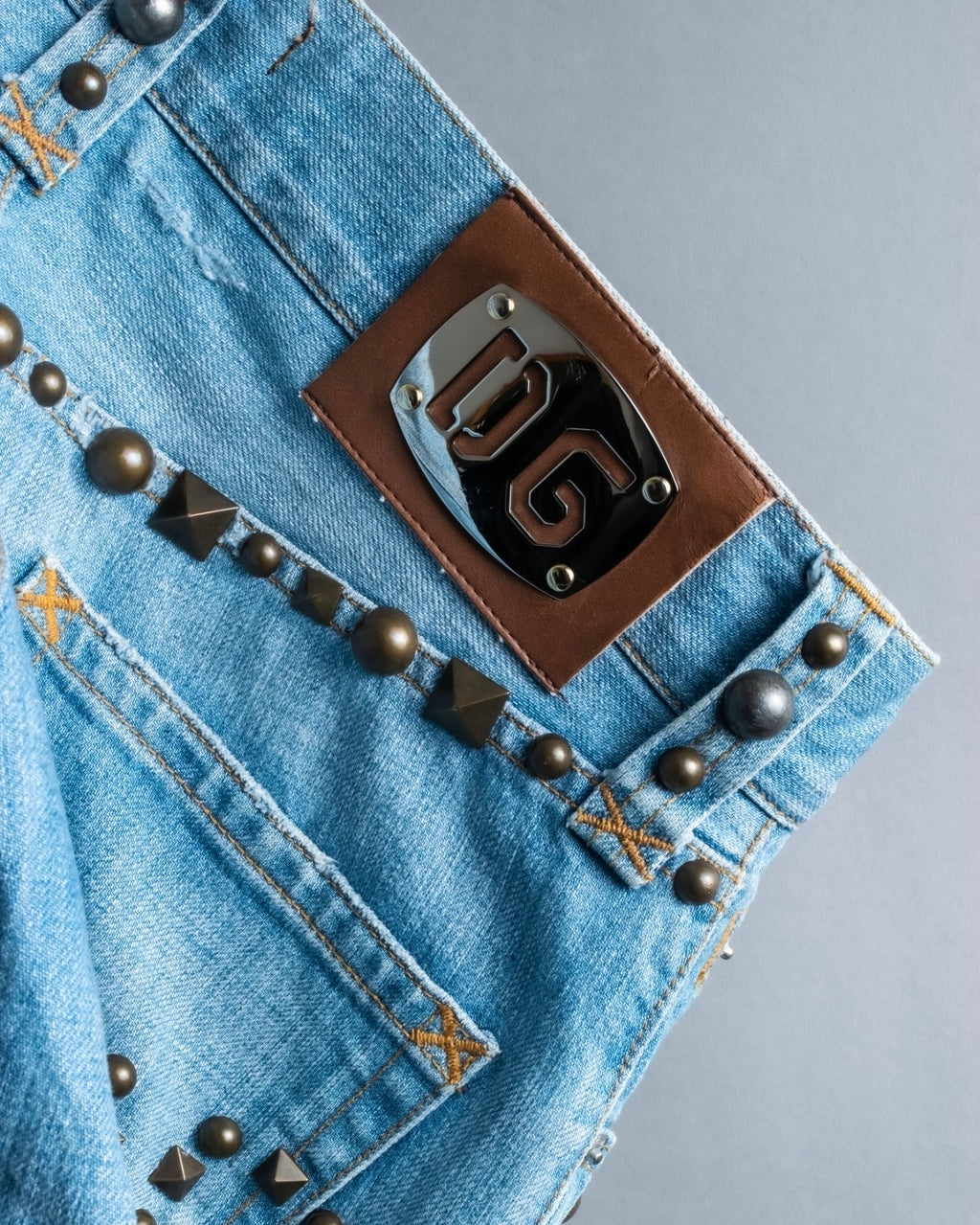 "DOLCE &amp; GABBANA" various studded distressed denim