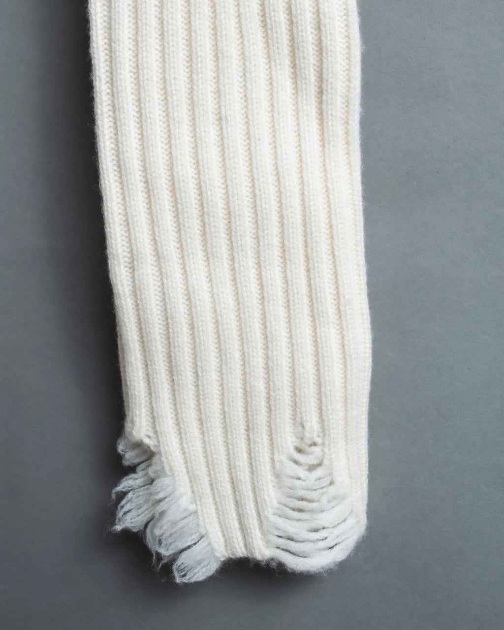 Distressed long sleeve knit