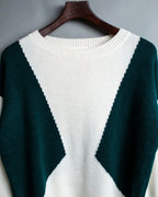 Distressed long sleeve knit