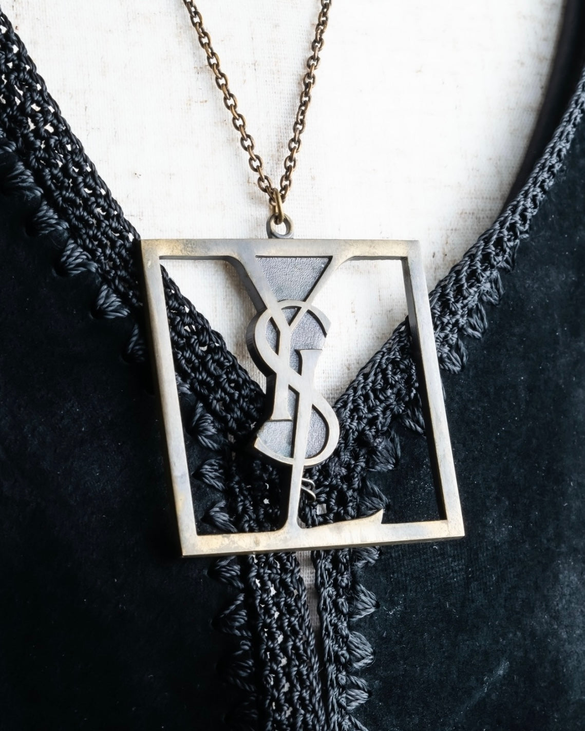 "Yves Saint Laurent" frame design logo motif necklace