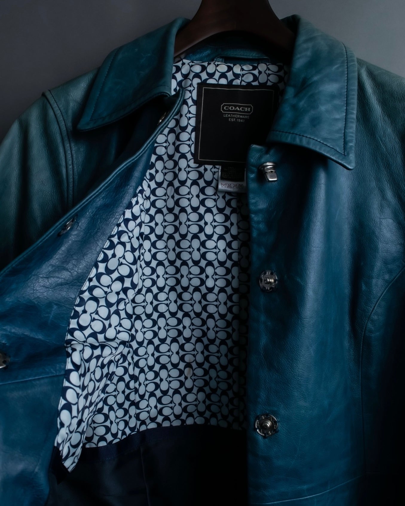 "COACH" light blue faded leather coat
