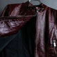 "BRUNOMAGLI" Scratched leather double zip red jacket