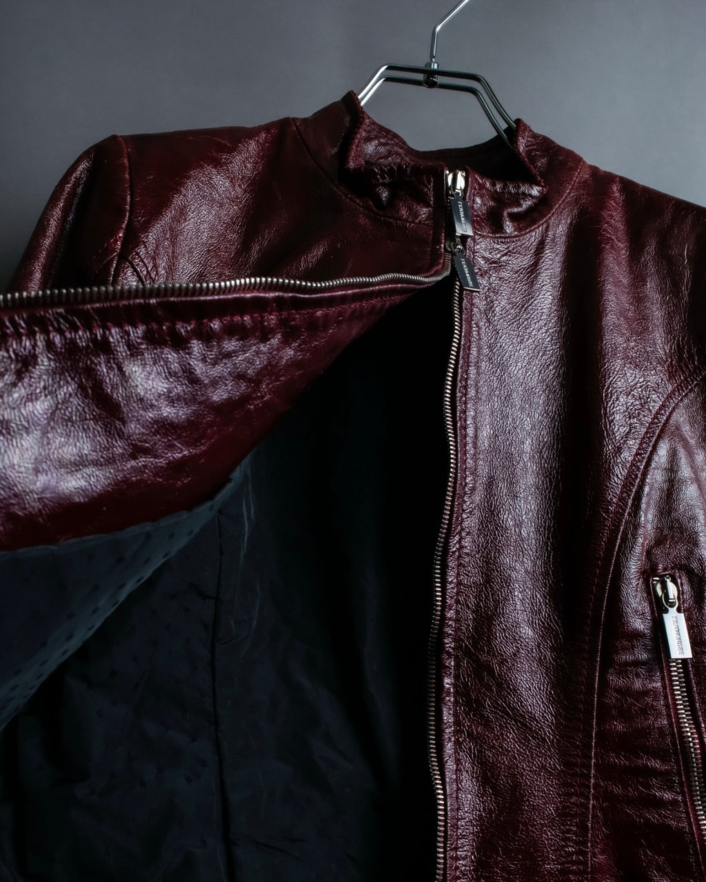 "BRUNOMAGLI" Scratched leather double zip red jacket