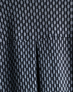 Vintage three-dimensional processed monotone polyester shirt