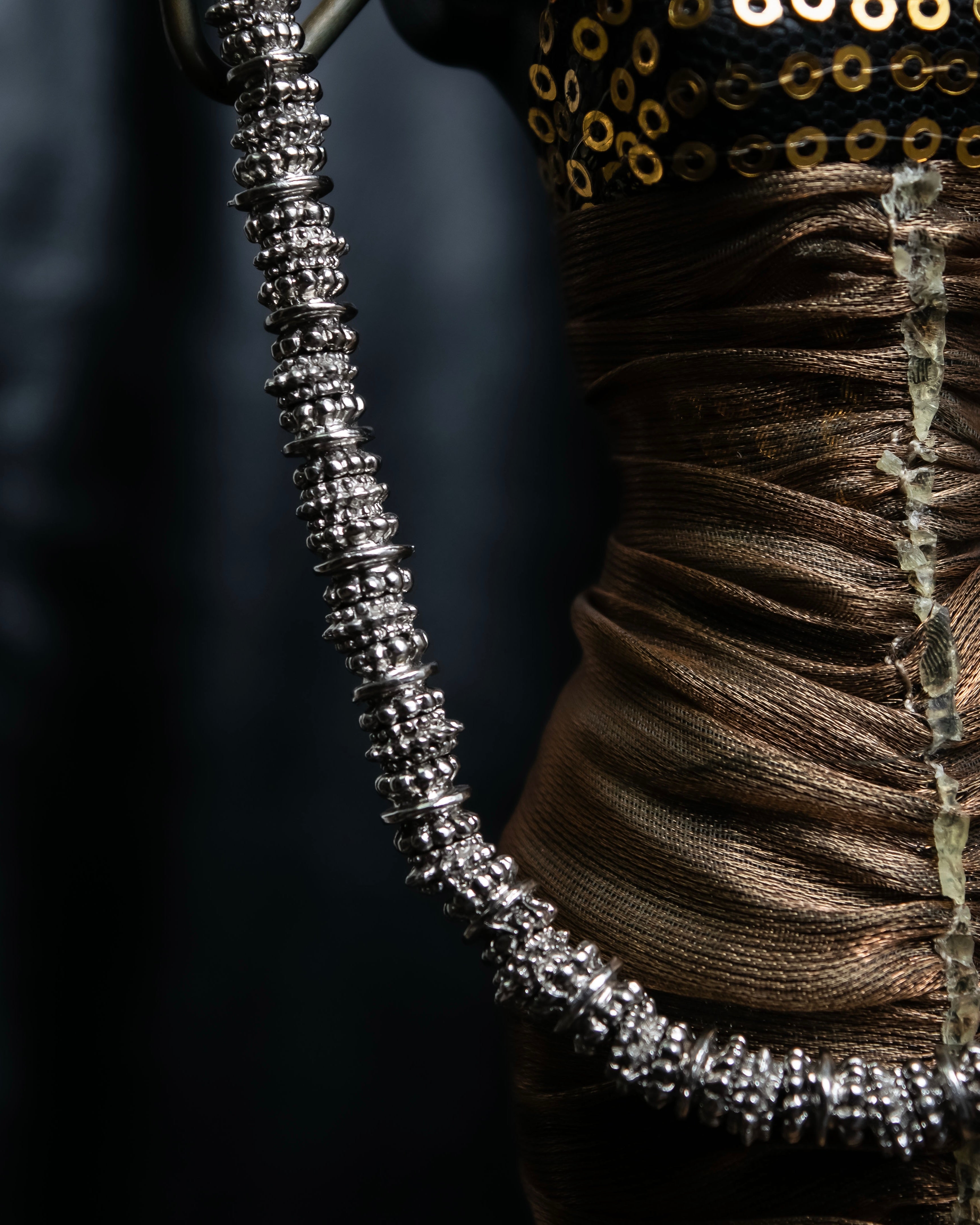 "Yves Saint Laurent"
Different sized beads silver necklace